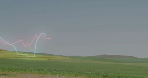 Panoramic view of green fields with distinct chart overlay