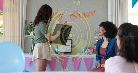 Standing woman marking boy or girl chalkboard at home baby shower gender reveal party