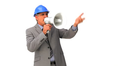 Architect in Suit and Hard Hat Using Megaphone on White Background