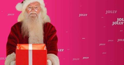Santa Claus with Festive Gift on Bright Pink Background