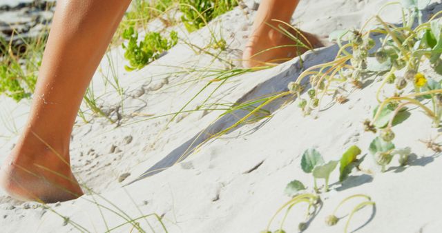 Close-Up of Bare Feet Walking on Sandy Beach Dunes - Download Free Stock Images Pikwizard.com