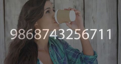 Eco-conscious woman enjoying coffee outdoors