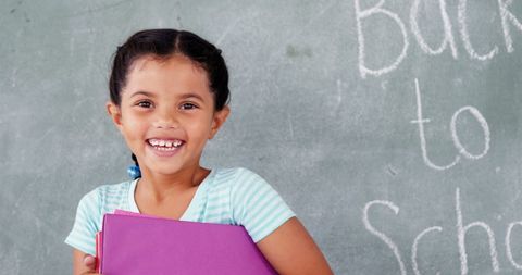 Smiling Girl with Notebook Welcoming New School Year - Download Free Stock Images Pikwizard.com