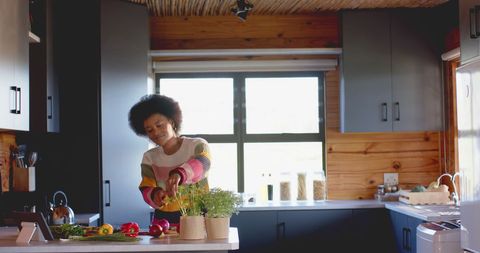 African American Woman Following Recipe on Tablet in Home Kitchen - Download Free Stock Images Pikwizard.com