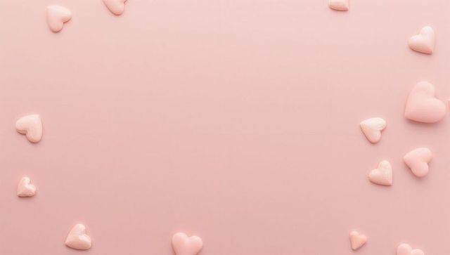 Pastel pink glossy heart border framing large central copy space for valentine layout
