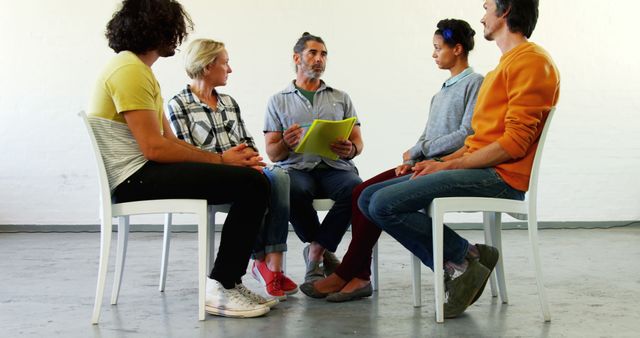 Diverse Group Sitting in Circle Engaging in Group Discussion - Download Free Stock Images Pikwizard.com