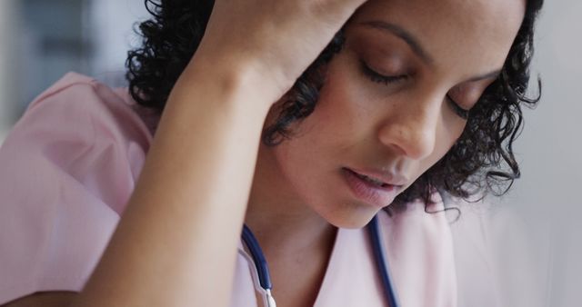 Tired Nurse Resting with Eyes Closed in Hospital - Download Free Stock Images Pikwizard.com