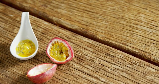 Fresh Passion Fruit and Pulp in Ceramic Spoon on Wooden Surface - Download Free Stock Images Pikwizard.com