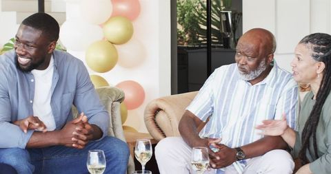 Joyous family gathering celebrating pregnancy announcement