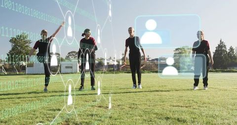 Female athletes standing on sports field with augmented reality training overlays