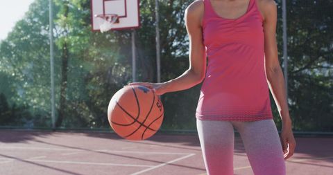 Female Basketball Player on Outdoor Court