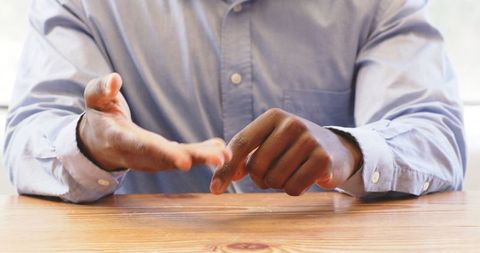 Business Executive in Blue Shirt Concentrating at Wooden Desk - Download Free Stock Images Pikwizard.com