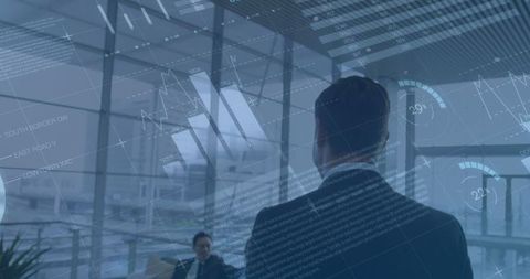 Businessman Analyzing Digital Data in Futuristic Setting