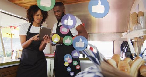 Chefs Receiving Social Media Likes on Digital Tablet