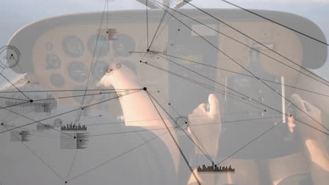 Pilot Operating Aircraft Controls with Digital Overlay Network Concepts