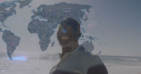 Globally Connected Lifestyle: Smiling Man at Ocean with Digital Overlay