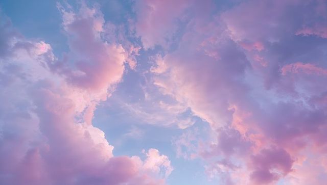 Pastel Skies with Dreamy Cloud Formation in Dawn Light