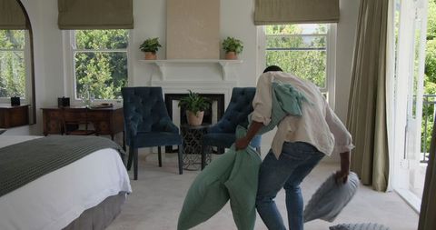 Groom preparing bedroom for wedding day
