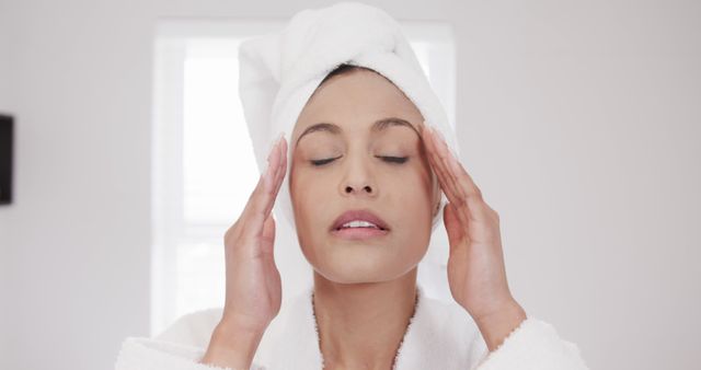 Woman Relaxing with Head Wrapped in Towel After Bath - Download Free Stock Images Pikwizard.com