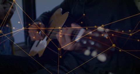 Guitarist Strumming in Home Studio with Data Network Overlay