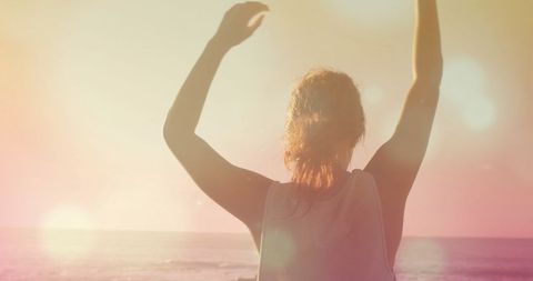 Silhouette of Woman Practicing Yoga on Beach Against Sunset - Download Free Stock Images Pikwizard.com