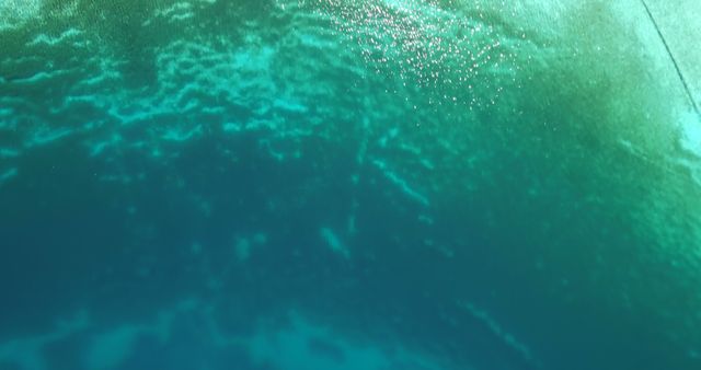 Aerial View of Turquoise Sea with Sunlight Reflections - Download Free Stock Images Pikwizard.com