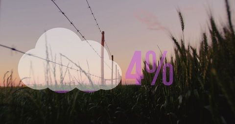 Cloud data concept with purple 4% overlay hovering over dusk rural field and fence