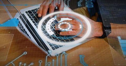 Typing on laptop with futuristic hud overlay and smartwatch showing cyber tech interface