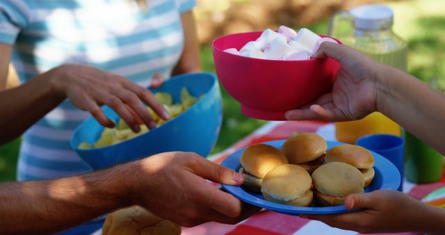 Summer Picnic with Family and Friends, Enjoying Snacks Outdoors - Download Free Stock Images Pikwizard.com