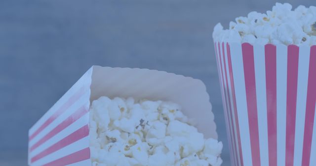 Red and White Popcorn Tubs on Grey Background - Download Free Stock Images Pikwizard.com