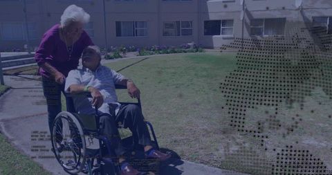 Elderly Couple Enjoying Warm Sunny Day Outside Home