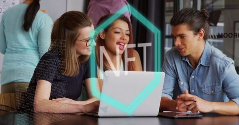 Diverse Team Discussing NFT Blockchain Technology at Office