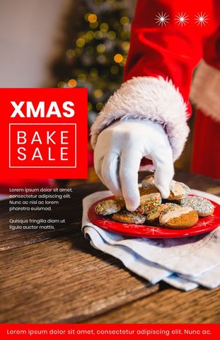Christmas bake sale concept with santa claus hand and cookies