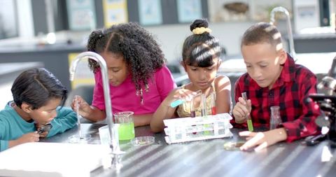 Curious Students Engaging in Lively Science Experimentation