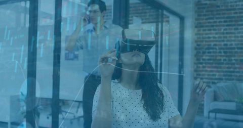 Woman Interacting with Data via Virtual Reality in Modern Office - Download Free Stock Images Pikwizard.com
