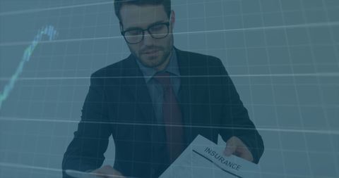 businessman analyzing insurance documents and financial data - Download Free Stock Images Pikwizard.com