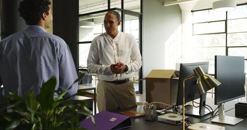 Professionals Collaborating in Open Office Environment