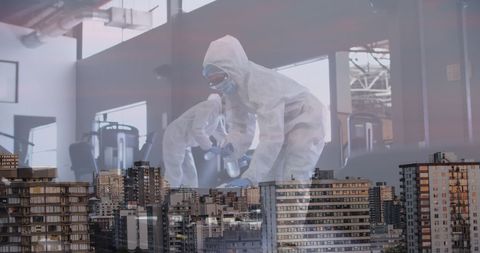 Pandemic Impact on Urban Life: Workers in Hazmat Suits Over Cityscape - Download Free Stock Images Pikwizard.com