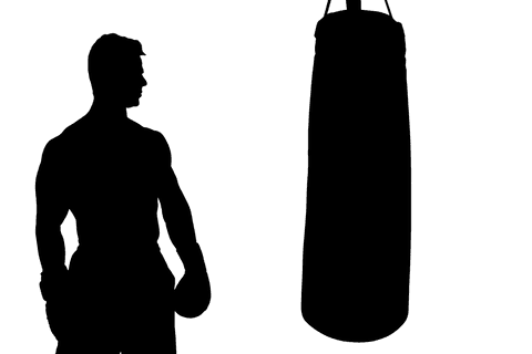 Transparent silhouette of male boxer with boxing bag workout