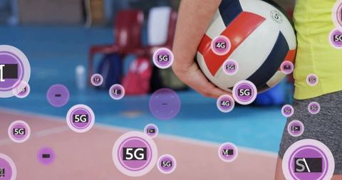 Athlete Holding Volleyball with Overlay of 5G Technology Symbols