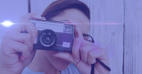 Female Photographer Capturing Moments with Vintage Camera - Download Free Stock Images Pikwizard.com