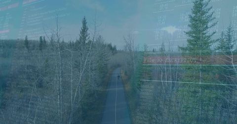 Teen cycling on forest trail with encryption code overlay — youth biking technology concept