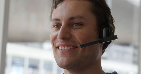 Smiling Customer Support Professional with Headset
