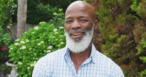 Smiling Senior African American Man in Lush Garden - Download Free Stock Images Pikwizard.com