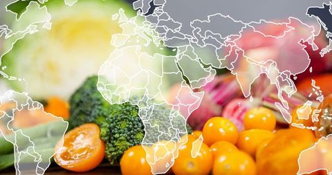 World map overlaid on fresh vegetables for global health and nutrition