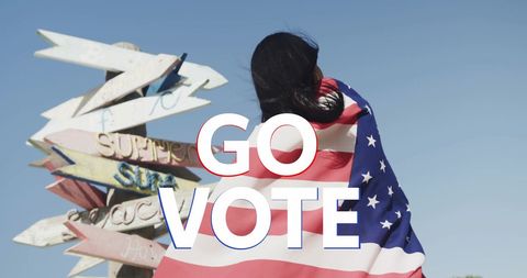 Patriotic woman promoting voting with usa flag