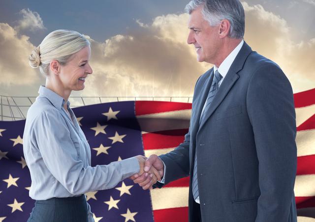 Mature business executives shaking hands symbolizing successful partnership against American flag background. Suitable for use in contexts relating to business collaborations, corporate success, patriotic business endeavors, international agreements, and professionalism.