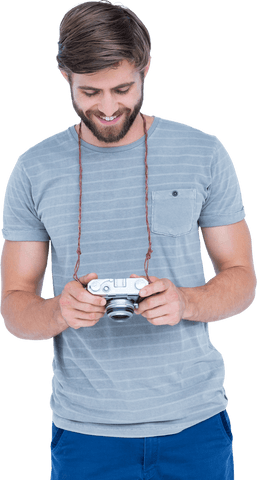 smiling young man holding digital camera isolated on transparent background - Download Free Stock Videos Pikwizard.com