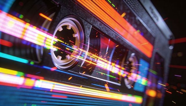Glowing retro cassette tape streaming neon glitches and pixel sparks, vibrant analog motion