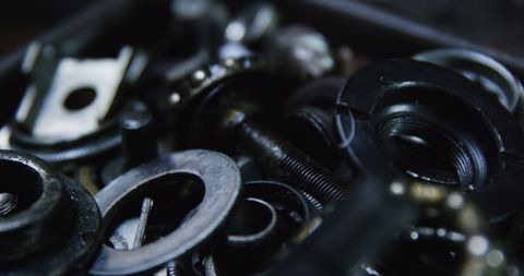 Close-up Mechanics Working with Bicycle Parts in Workshop